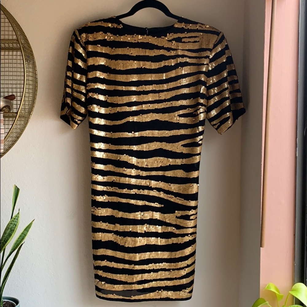 Black and gold sequin box dress